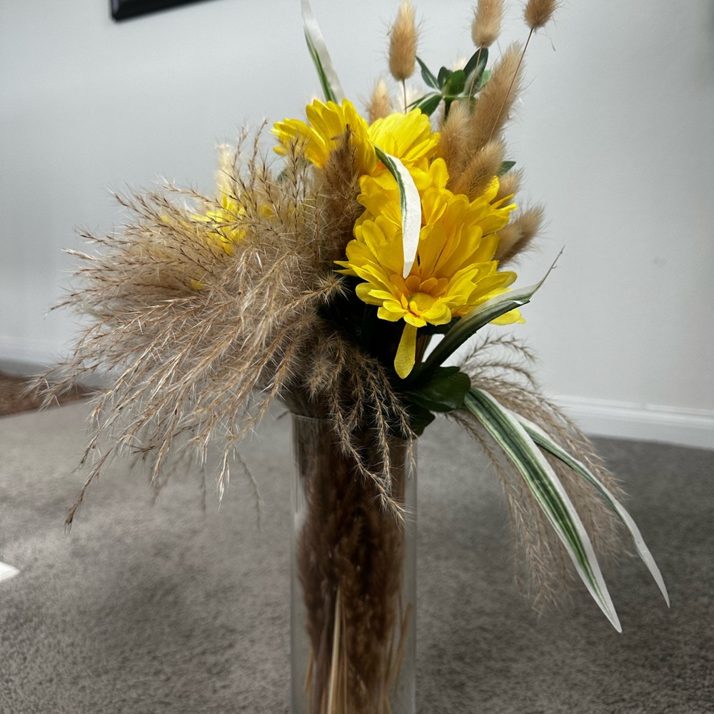 Yellow and Tan Floral Arrangement in Glass Vase